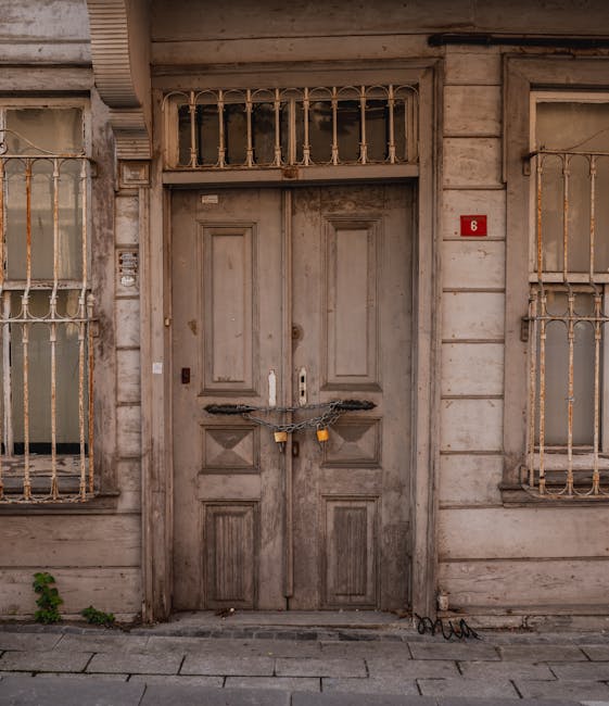 Secure heavy wooden door with padlock